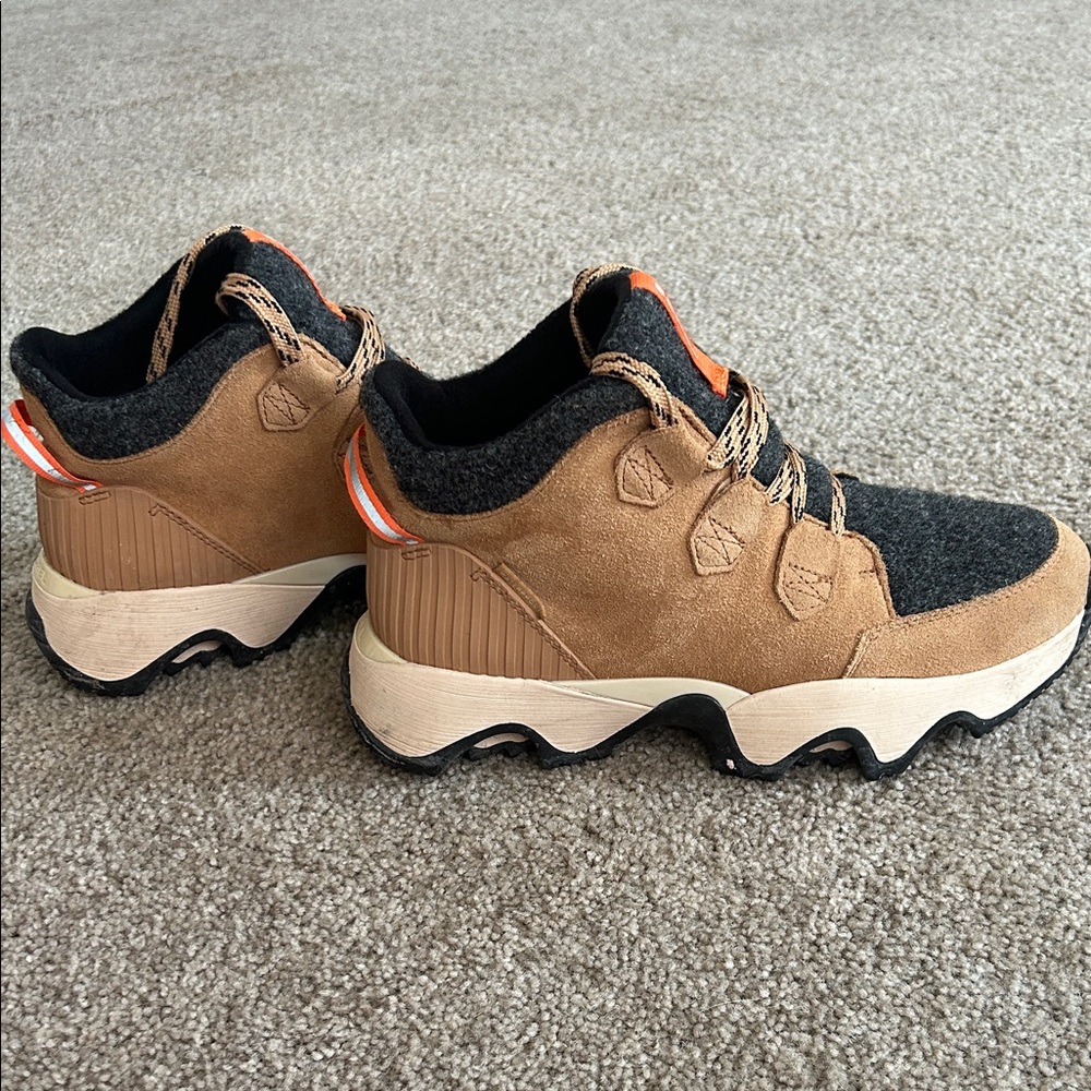 Sorel Tan and Black boots with Orange Highlights